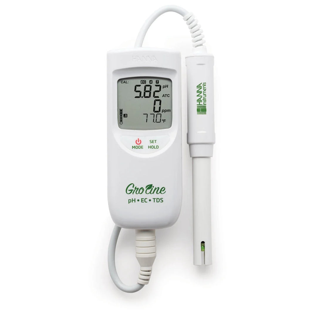 plastic meter with probe on white background
