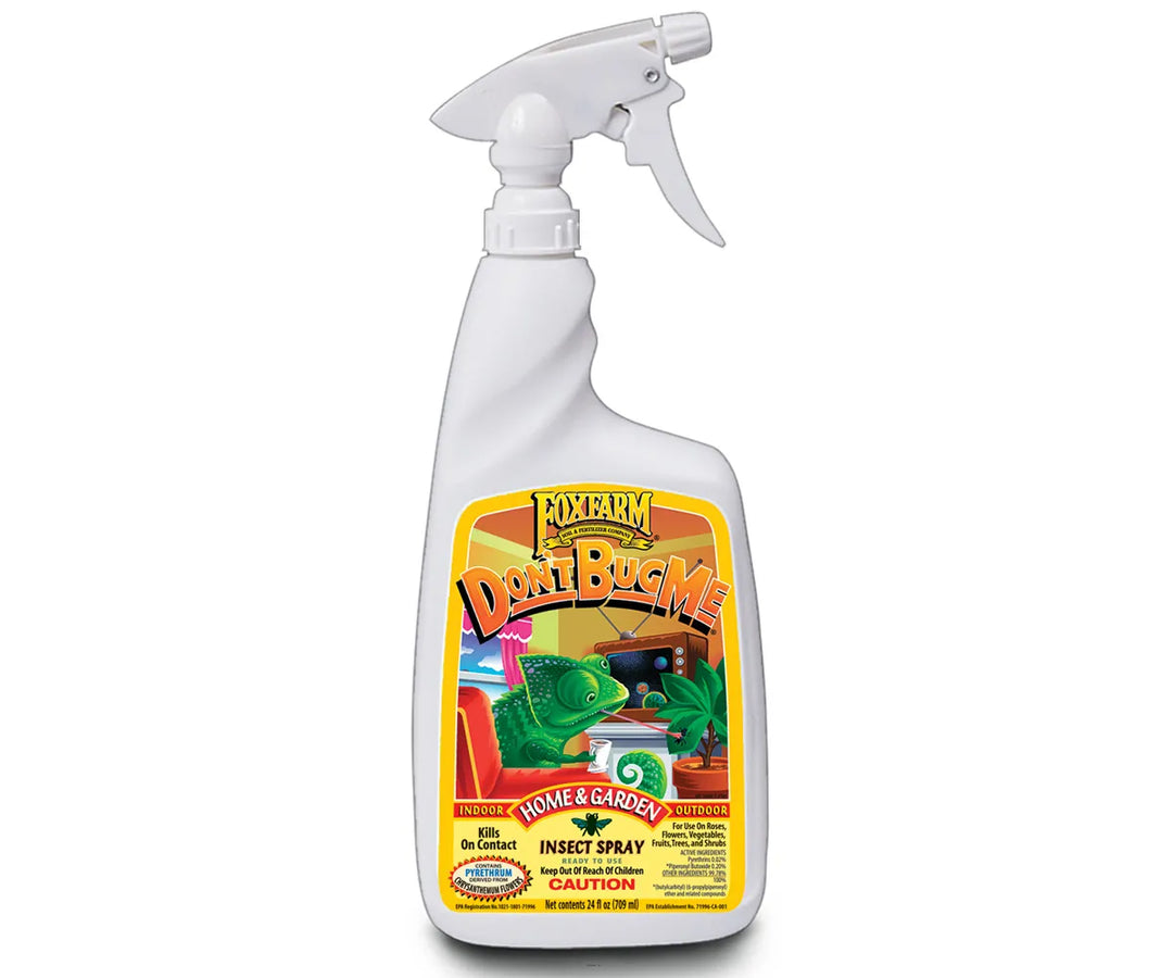 White plastic spray bottle with yellow label of bug spray