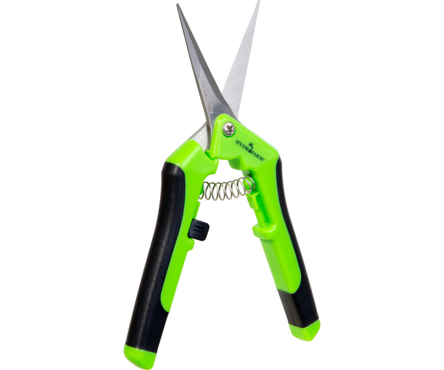 silver scissors with green handles