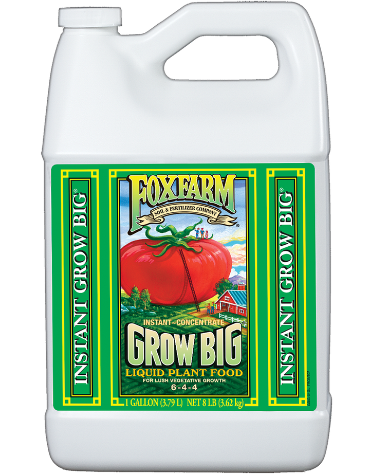 2.5 Gallon size white plastic bottle with green label of plant food